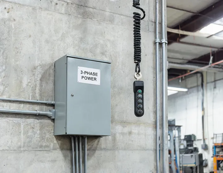 Electric chain hoist pendant and three-phase drop in a plant